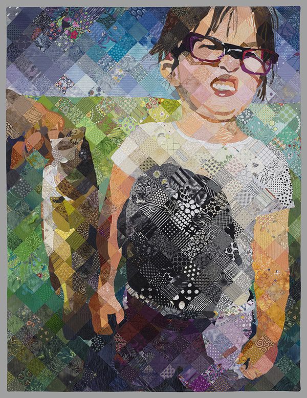 quilt with a boy on it